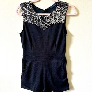 Embellished black romper. Size medium.